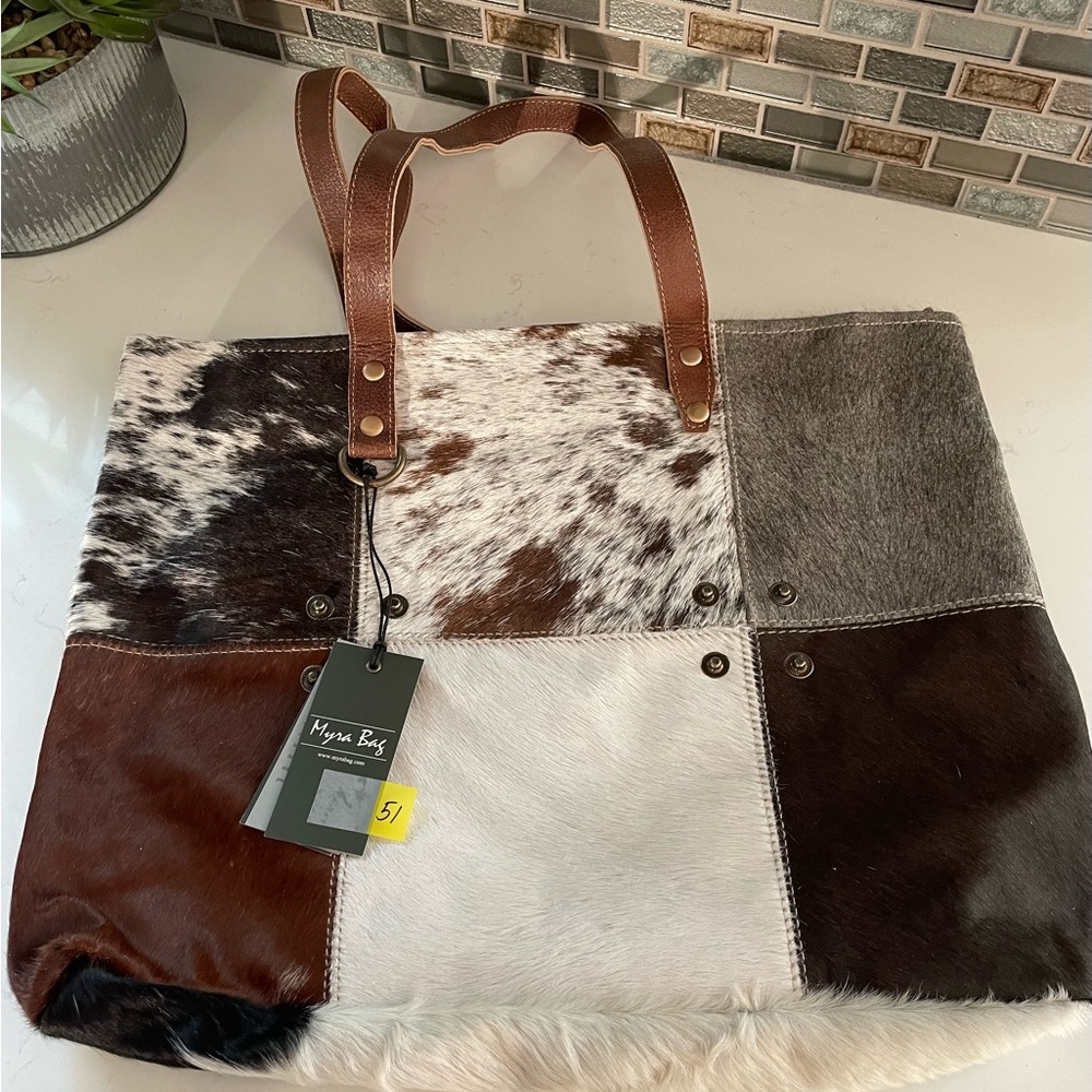 S1163 multi patch cowhide tote
